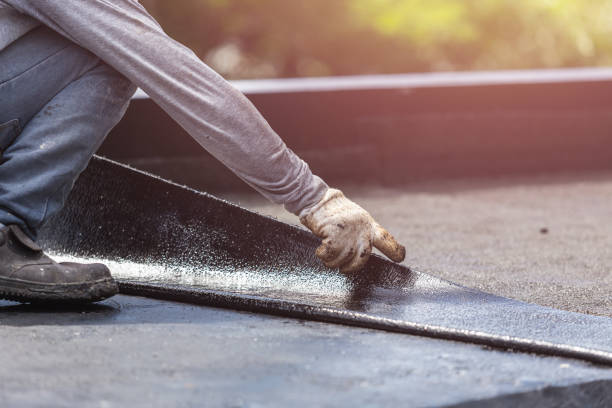 Professional Basement Waterproofing technician working in Bellevue, OH